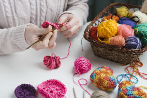 basket wool balls woman weaving