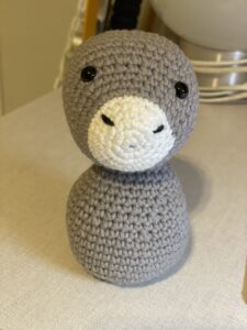 a knitted animal on a table