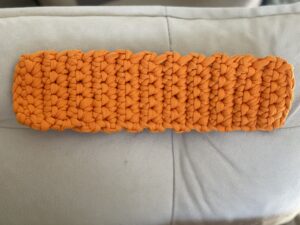 a close up of a knitted belt