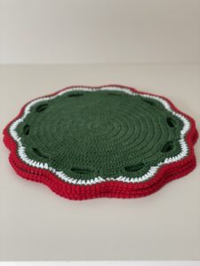 a knitted doily on a table