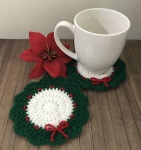 a mug and coasters on a table